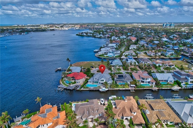 birds eye view of property featuring a water view