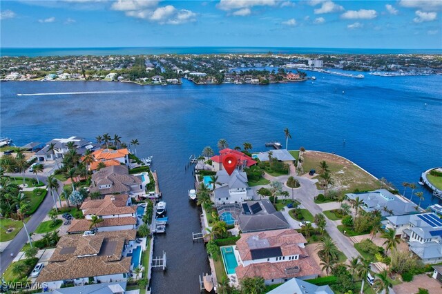 bird's eye view with a water view