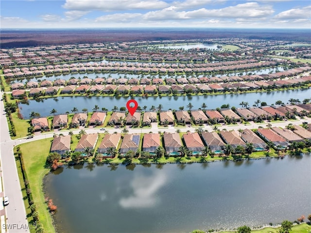 bird's eye view with a water view