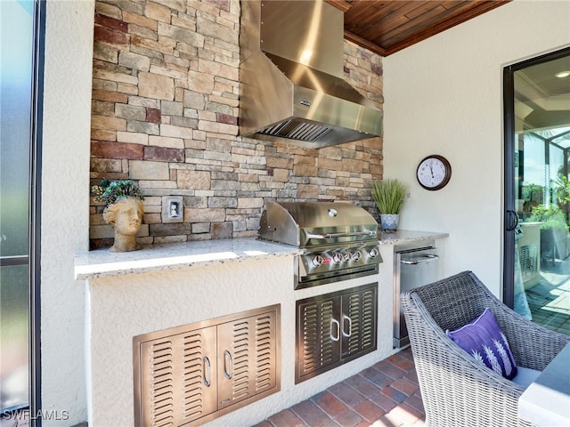 view of patio / terrace featuring exterior kitchen and grilling area