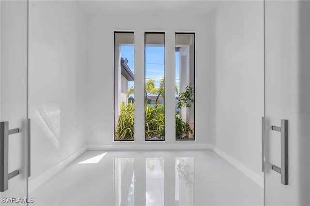 empty room featuring tile patterned floors