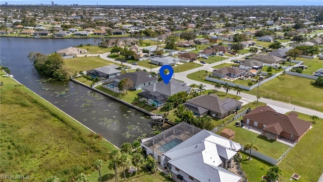 aerial view featuring a water view