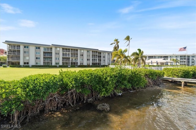 view of property with a water view