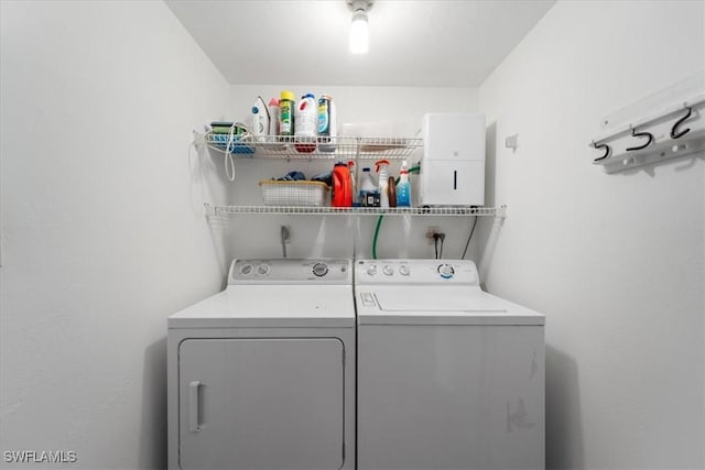 laundry room featuring independent washer and dryer