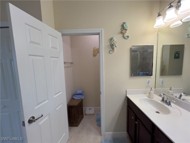 bathroom featuring tile patterned floors and vanity