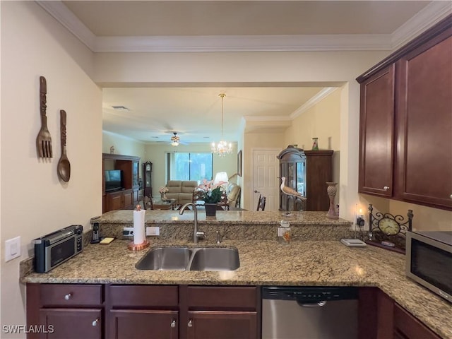 kitchen featuring appliances with stainless steel finishes, sink, hanging light fixtures, kitchen peninsula, and crown molding