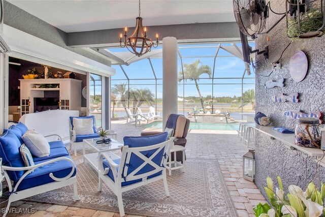 view of patio featuring an outdoor hangout area and glass enclosure