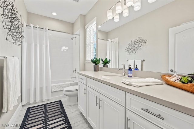 full bathroom featuring toilet, hardwood / wood-style flooring, shower / bath combo, and vanity