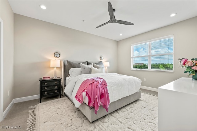 carpeted bedroom featuring ceiling fan