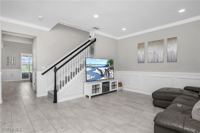 living room with ornamental molding