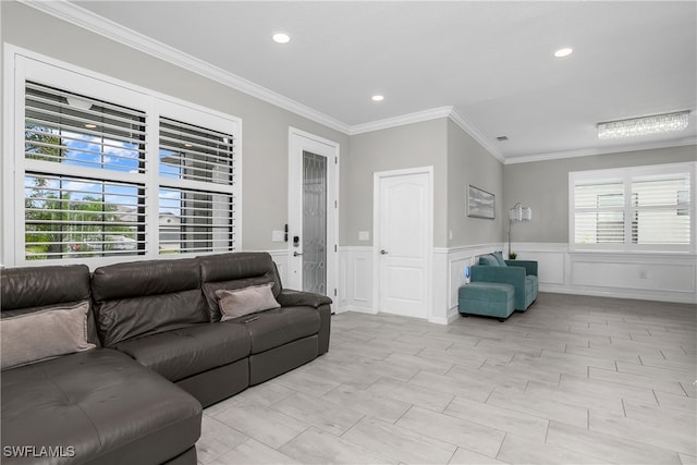 living room with ornamental molding