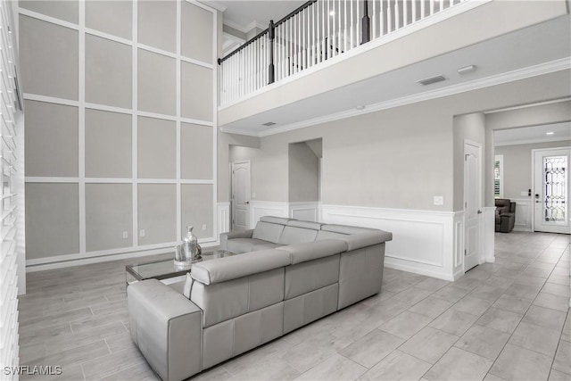 17641 Brooksin Ct, Estero, FL 33928 - living room with a towering ceiling and ornamental molding
