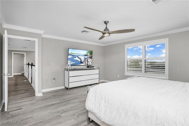 17641 Brooksin Ct, Estero, FL 33928 - bedroom featuring ceiling fan, light hardwood / wood-style floors, and ornamental molding
