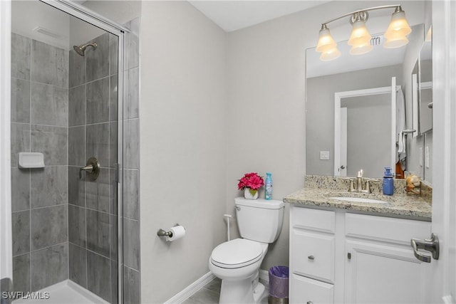 17641 Brooksin Ct, Estero, FL 33928 - bathroom with a tile shower, vanity, and toilet