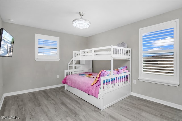 bedroom with light hardwood / wood-style floors