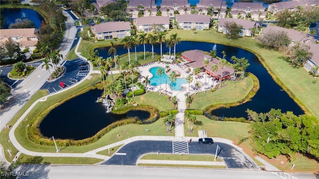 drone / aerial view with a water view