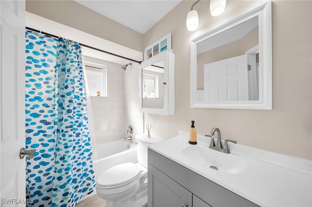 full bathroom featuring vanity, toilet, shower / bath combo, and hardwood / wood-style floors