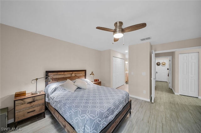 bedroom featuring light hardwood / wood-style flooring and ceiling fan