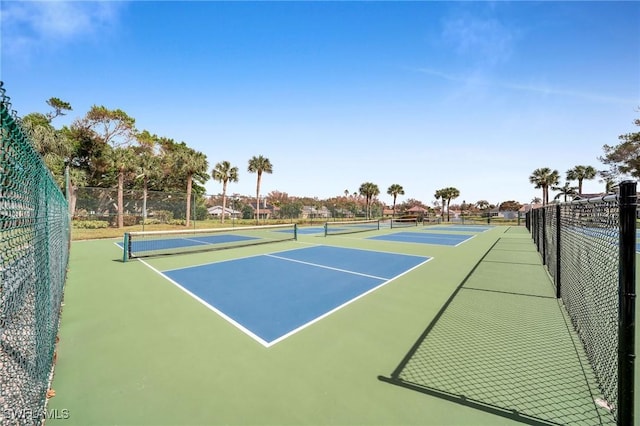 view of sport court featuring community basketball court and fence