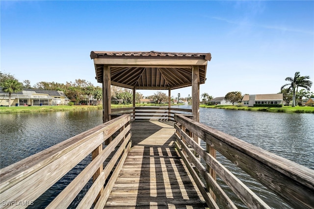 dock area with a water view and a gazebo