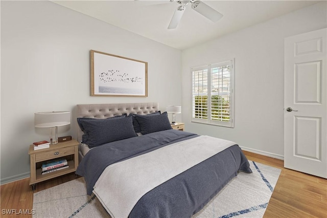 bedroom featuring ceiling fan and wood-type flooring