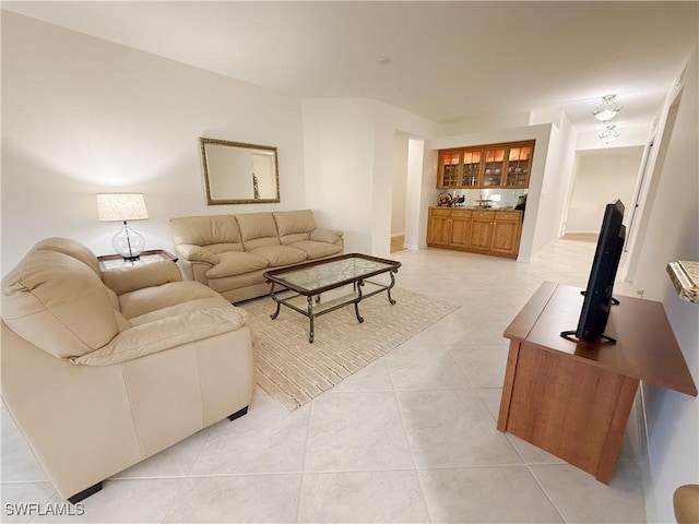 living room featuring light tile patterned flooring