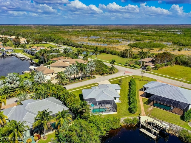 bird's eye view with a water view