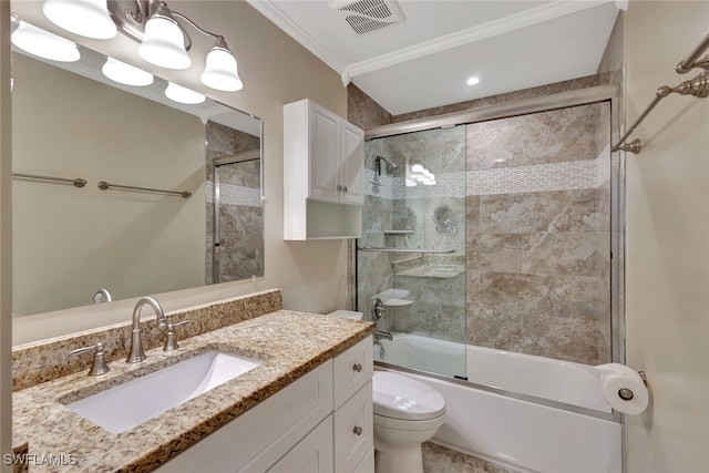 full bathroom with visible vents, toilet, ornamental molding, combined bath / shower with glass door, and vanity