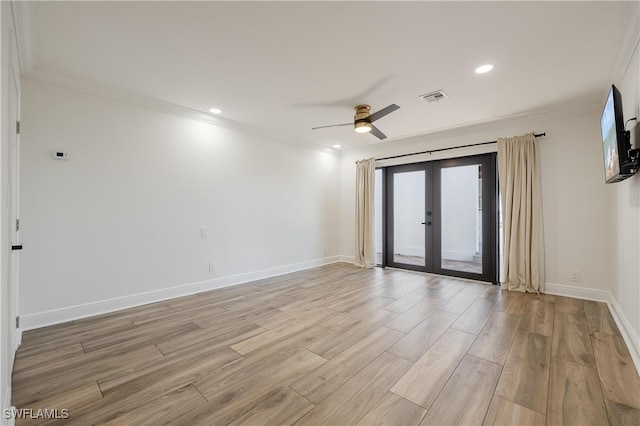 spare room with french doors, ceiling fan, ornamental molding, and light wood-type flooring