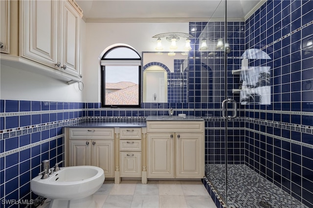 bathroom with a shower with door, a bidet, vanity, crown molding, and tile walls