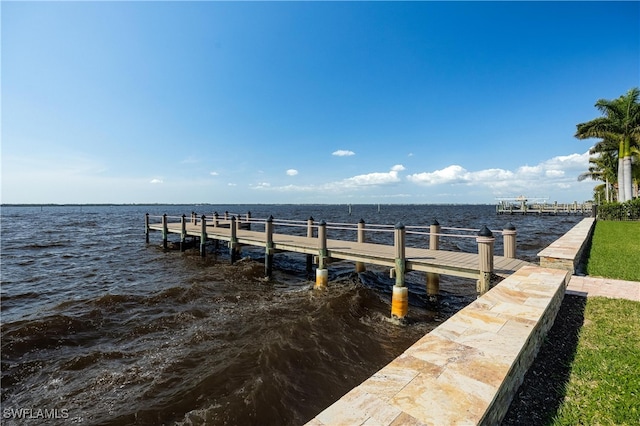 view of dock with a water view