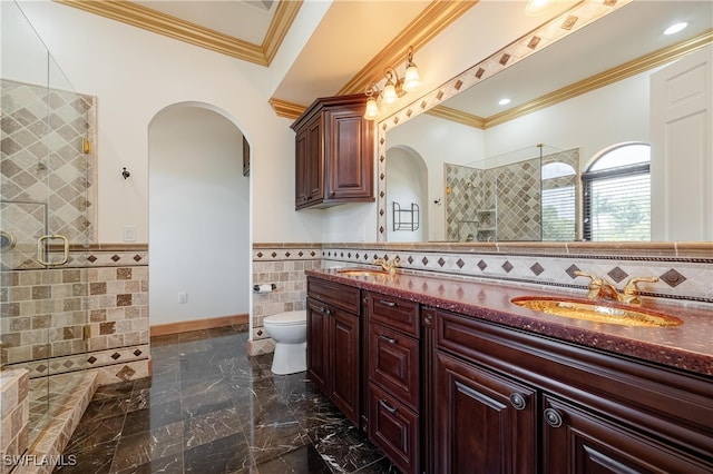 bathroom featuring toilet, walk in shower, tile walls, vanity, and crown molding