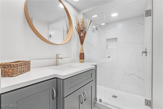 bathroom featuring vanity and walk in shower