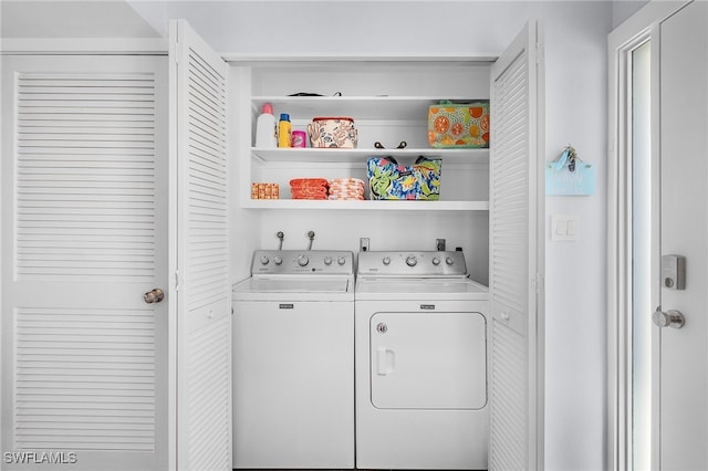 washroom with washer and clothes dryer