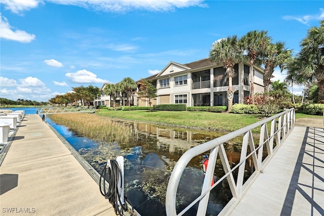 dock area with a water view