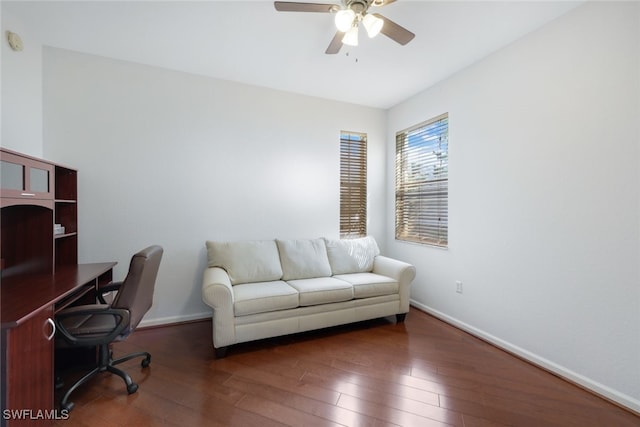 office area with ceiling fan and dark hardwood / wood-style flooring