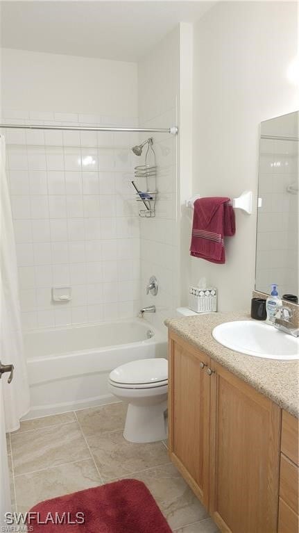 full bathroom with vanity, toilet, and shower / tub combo