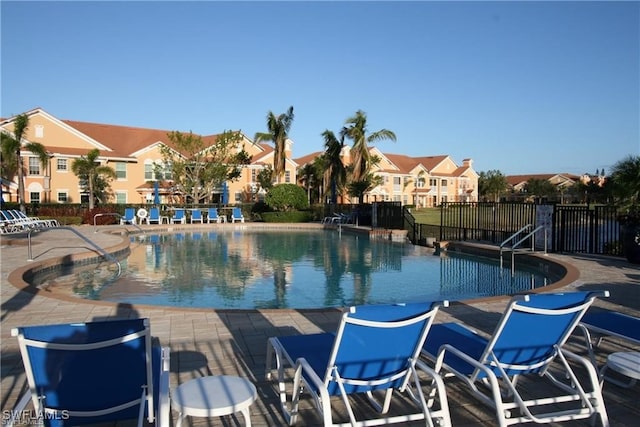 view of swimming pool featuring a patio