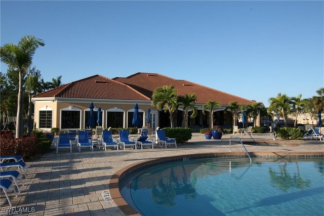 view of swimming pool featuring a patio