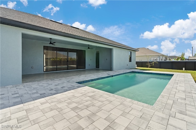 view of pool featuring a patio and ceiling fan