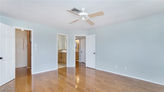 unfurnished room with light hardwood / wood-style flooring and ceiling fan