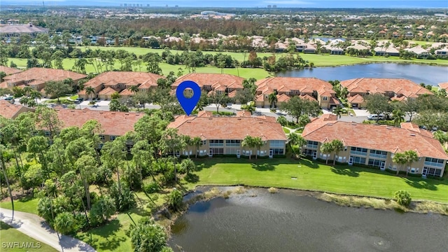 bird's eye view with a water view