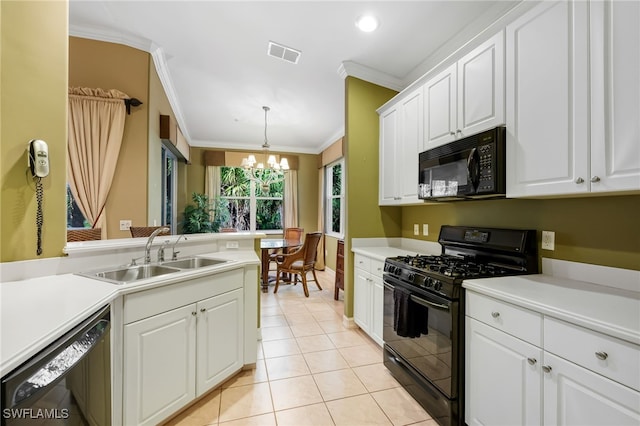 kitchen featuring white cabinets, black appliances, sink, and a chandelier