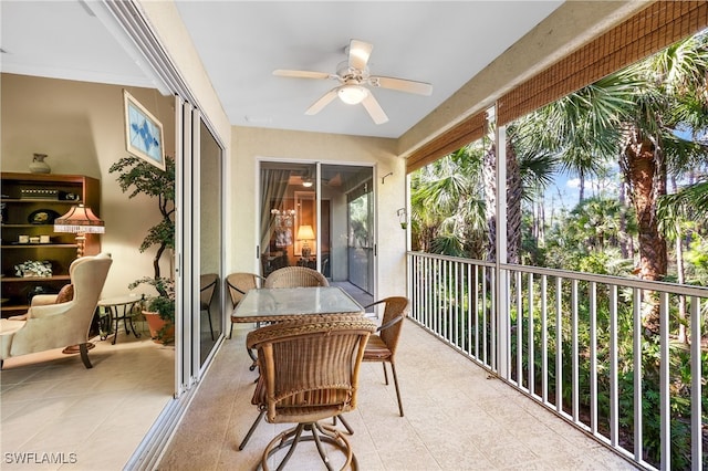 sunroom / solarium with ceiling fan