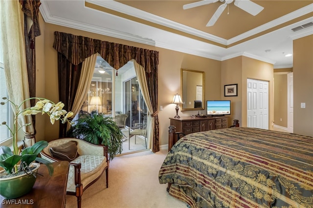 carpeted bedroom featuring access to exterior, ornamental molding, ceiling fan, and a closet