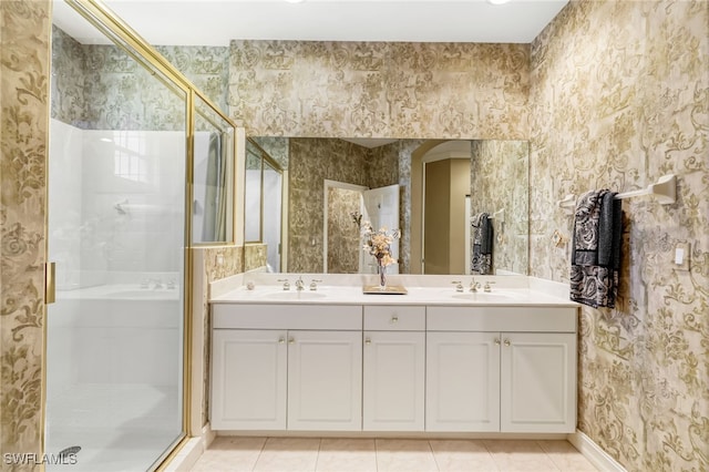 bathroom with vanity, tile patterned floors, and an enclosed shower