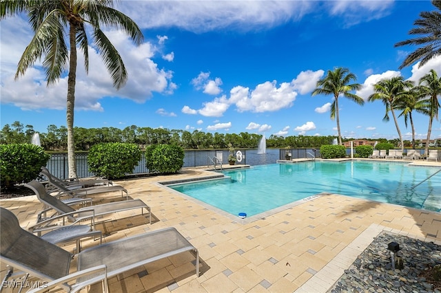 view of swimming pool featuring a patio