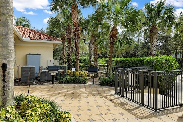 view of patio / terrace featuring cooling unit