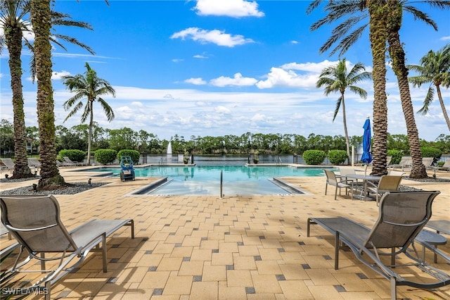 view of pool featuring a patio area