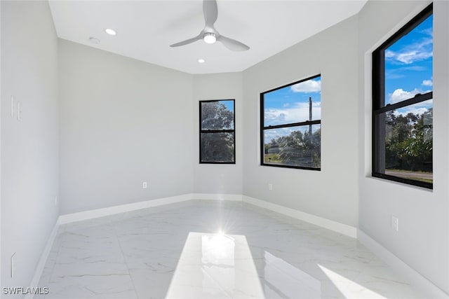 unfurnished room featuring ceiling fan